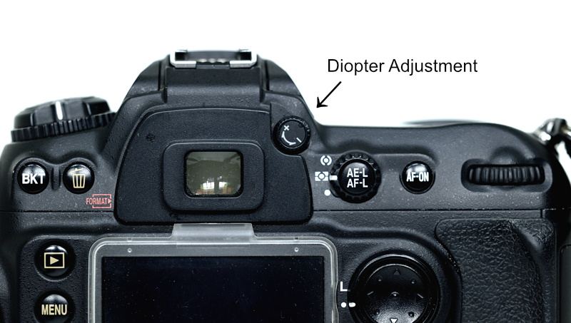 Diopter Adjustment knob as seen after removing the rubber viewfinder eye-cup from Nikon D200
